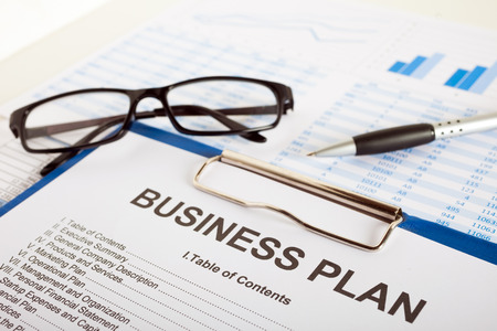 business plan over financial charts